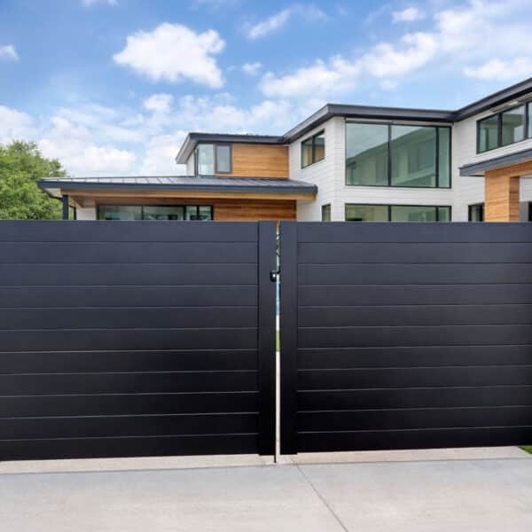 Black 6-inch aluminum slat double swing privacy gate at a modern Miami home