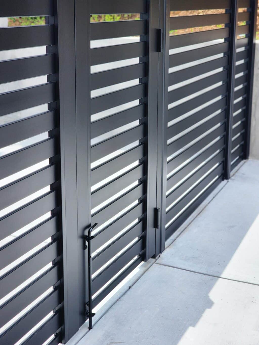 Premium black horizontal aluminum slat single gate with 2.56 inch slats and 1 inch spacing